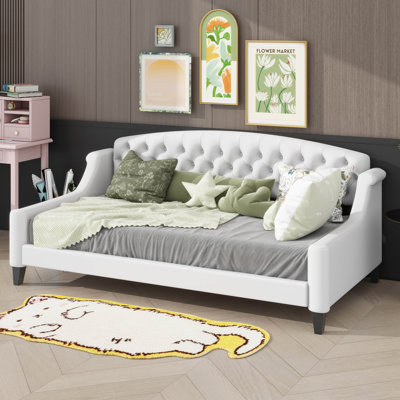 Lit de jour sophistiqué et contemporain orné de boutons capitonnés moelleux