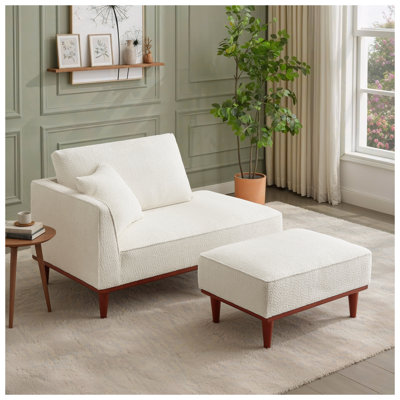 Chaise longue blanche rembourrée avec repose-pieds