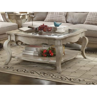 Table basse en verre transparent et finition taupe antique