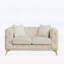 Luxueux canapé de style Chesterfield en velours avec détails capitonnés et pieds en métal, y compris 2 coussins décoratifs, beige