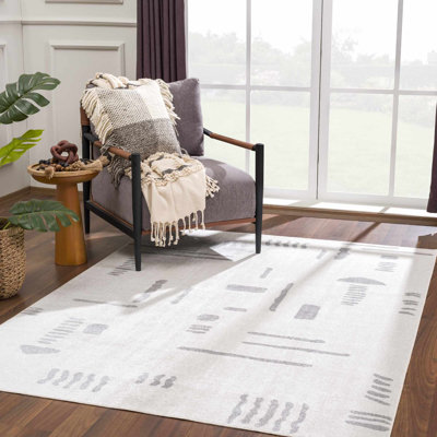 Kaamini Abstract Machine Washable Cream Area Rug