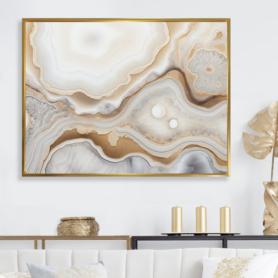Géode de paysage de pierre beige et doré sur fond de minimalisme