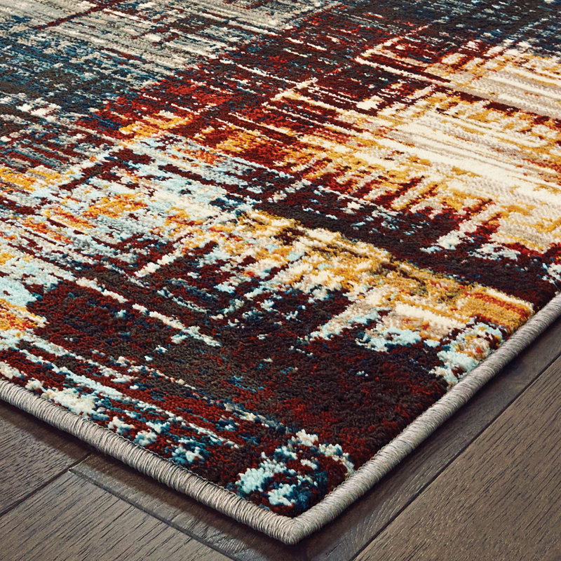 Tapis rouge/bleu tissé à la machine Jovie, Rectangle 9 pi 10 po x 12 pi 10 po