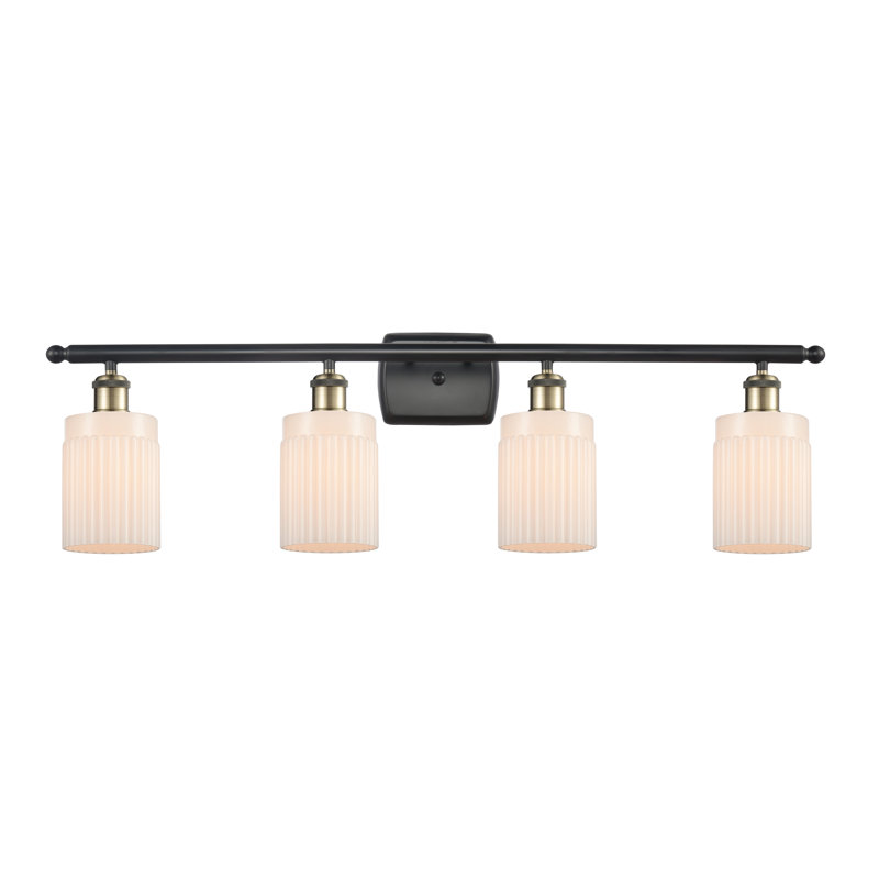 Éclairage pour salle de bain 4 lumières Caplinger, Blanc mat, Ampoule DEL 6 watts Vinage, Laiton antique noir