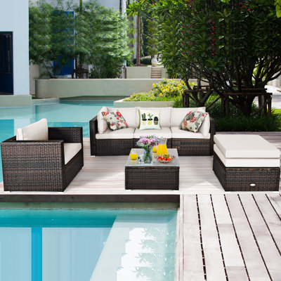 Patiojoy 7 Piece Rattan Sectional Seating Group with Cushions by Latitude Run