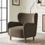 Fauteuil club rembourré à oreilles