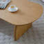 Table basse moderne en bois massif de forme ovale minimaliste-428386871