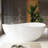 63 " L x 37.4 " W Freestanding and Mounting / Installation Required Soaking Solid Surface Bathtub