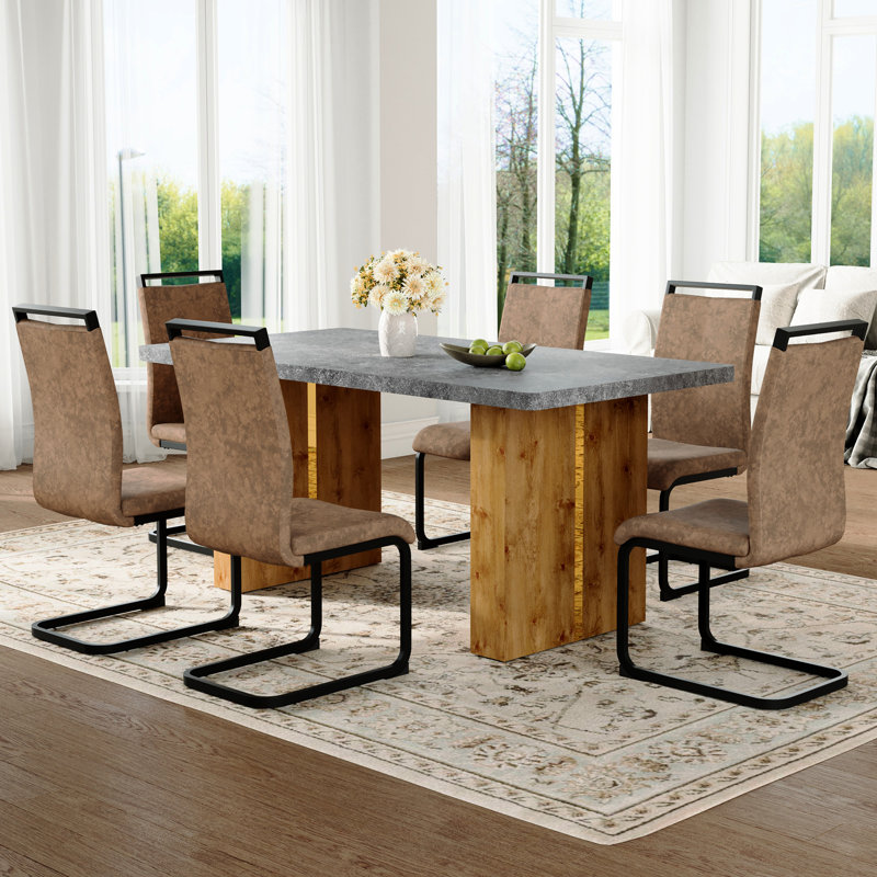 Table de salle à manger élégante avec 4 chaises en tissu brun, pieds arqués en métal noir pour différents espaces