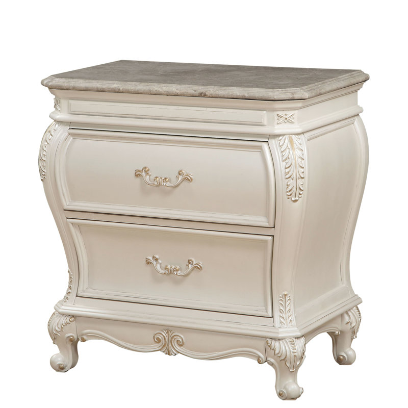 Magnifique table de chevet blanc perle avec garniture en granit et compartiment de tiroir abondant Magnifique comptoir en granite offrant beaucoup de rangement pour les articles de chambre à coucher