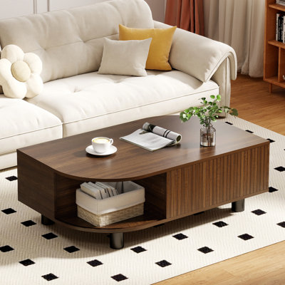 Table basse en bois avec rangement et portes coulissantes cannelées pour le salon, conception unique en forme de feuille