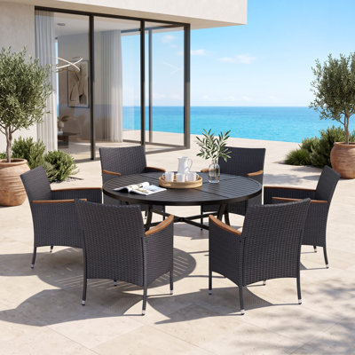 Sutiya 6 - Person Steel Patio Dining Set Umbrella Hole Included Round Table with Cushions Included