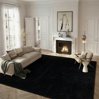 Artzt Black Area Rug