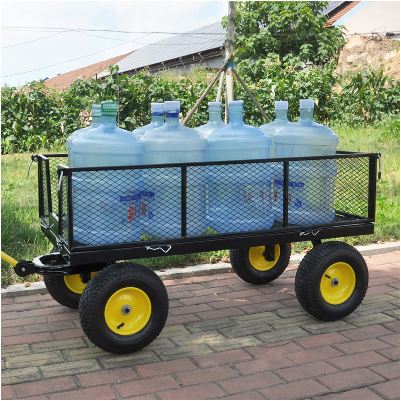 Les chariots de jardin BIG Wagon Cart facilitent le transport du bois de chauffage jaune et noir. La charge statique maximale est de 880 lb.
