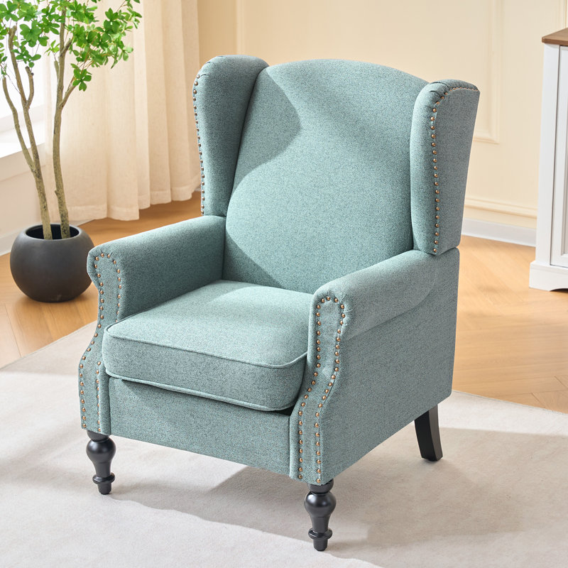 Fauteuil à oreilles rembourré avec garniture cloutée, Vert clair