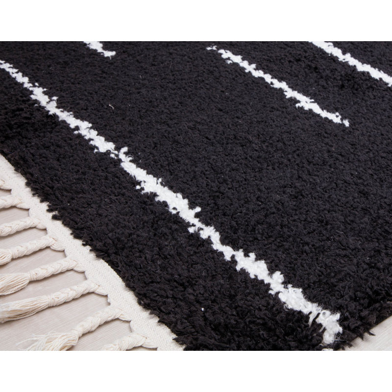 Introspective Black Abstract Shag Synthetic Area Rug with Braided Tassels