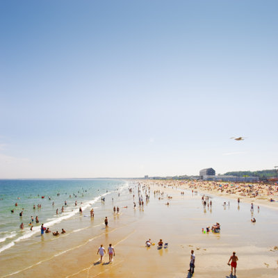 Busy Public Beach on a Clear Sunny Day by Soubrette