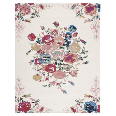 Delmarie Hand Tufted Wool/Cotton Floral Rug in Pink/Red/Ivory