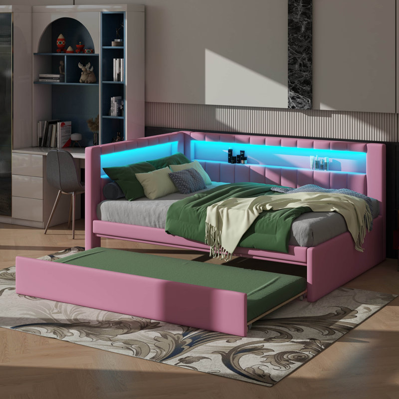 Entirely Upholstered Platform Bed Boasting USB Ports, LED Lighting, And A Trundle, Pink