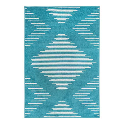 Tapis bleu à motif géométrique