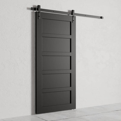 Porte de grange en bois avec quincaillerie d'installation