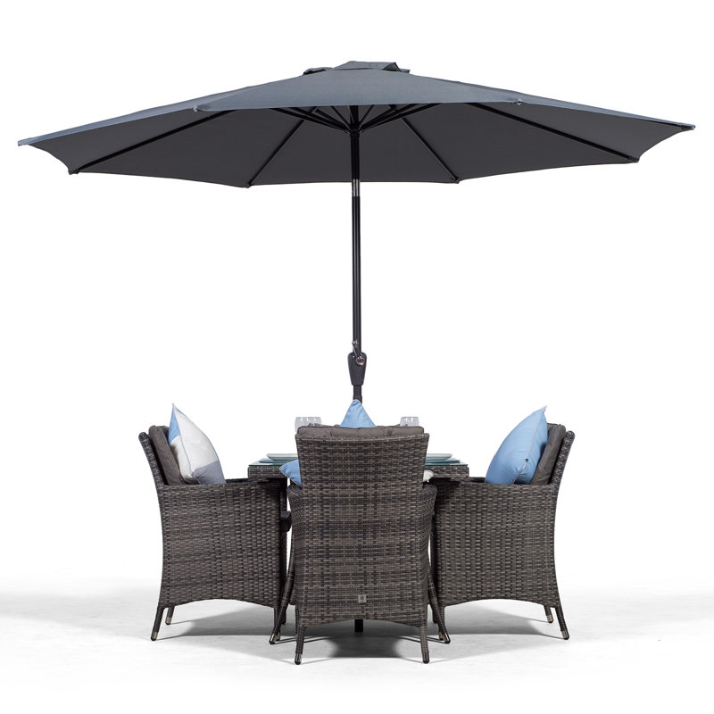 Karcher 4 - Person Wicker Patio Dining Set with Square Table , Cushions Included