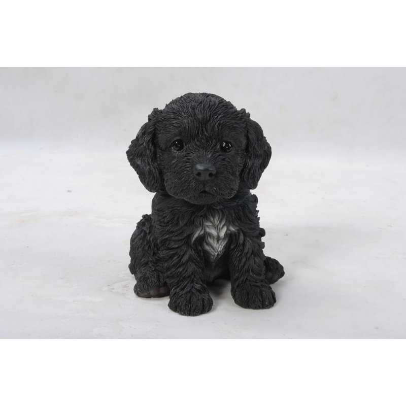 Statue chiot cockapoo assis