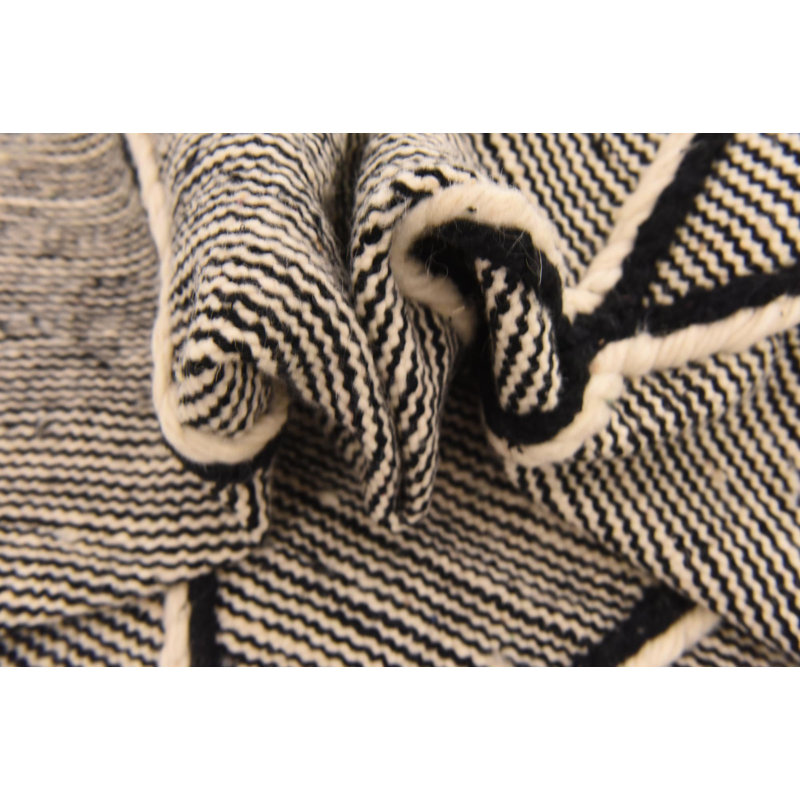 Tapis noir et blanc Orpheus