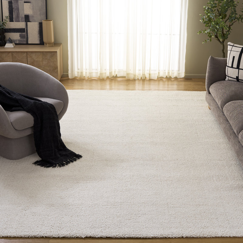 Borinka Solid Color Hand Tufted Wool Area Rug in Ivory, Rectangle 8' x 10'