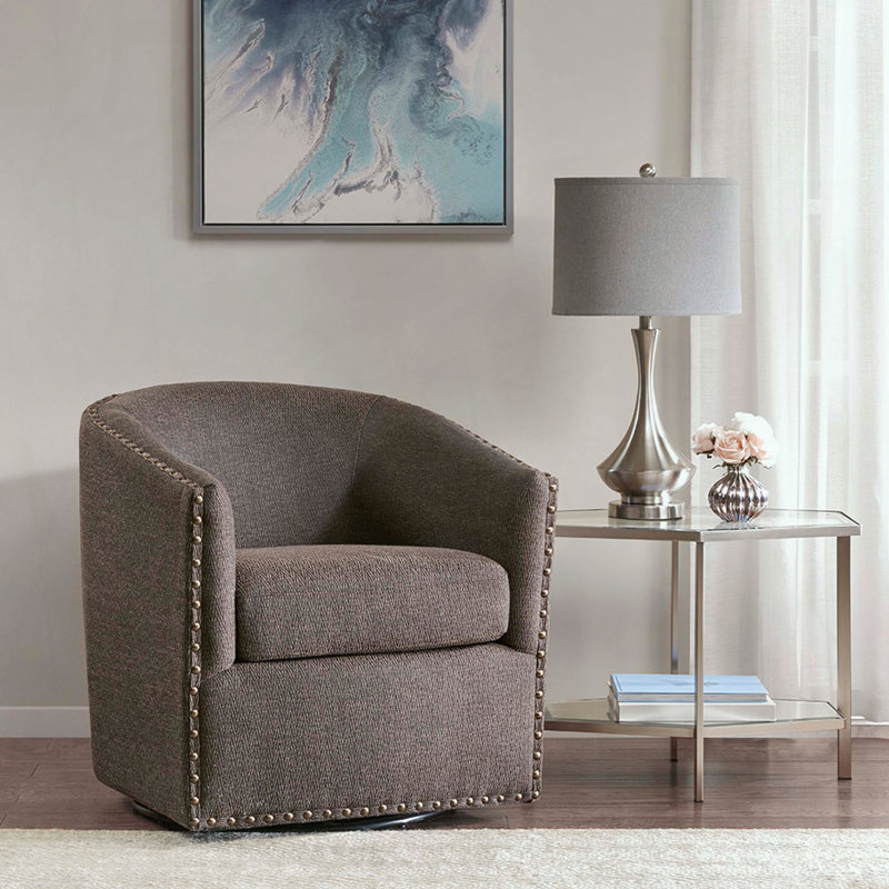 Chaise pivotante avec garniture cloutée en bronze