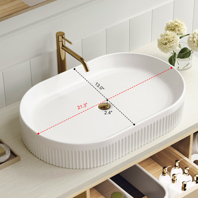 Meuble-lavabo mural moderne de 39,3 pouces avec lavabo ovale en céramique, design flottant et armoire en bois massif multicouche