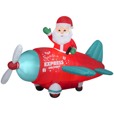 Animated Christmas Inflatable Santa in Vintage Plane