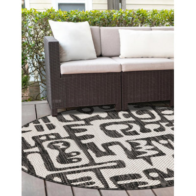 Tapis contemporain de couleur noire Nykeia