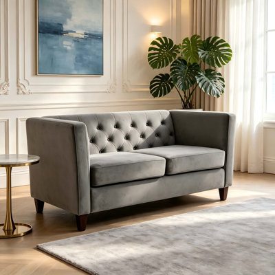 Canapé deux places en velours capitonné de style milieu du siècle avec pieds en bois massif pour une assise confortable et une décoration élégante pour le salon.
