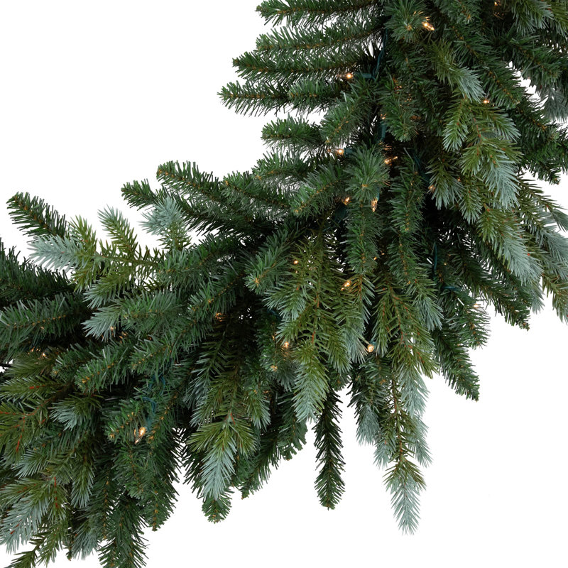 Festive Blue Spruce 49" Pre-Lit Artificial Christmas Wreath with Clear Lights
