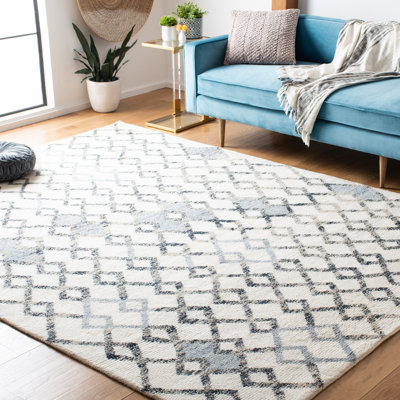 Gladney Hand Knotted Wool/Cotton Southwestern Rug in Ivory