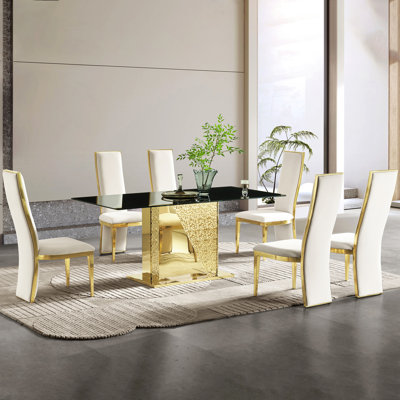 Table de salle à manger 68,07 pouces avec plateau en verre trempé noir et pieds en acier inoxydable doré - léger, rayé, minimaliste