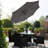 Dubose 4 Seater Rattan Round Dining Set with Grey LED Premium Parasol - Black