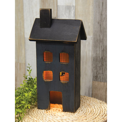 Maison lumineuse en bois patiné bleu clair