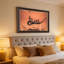 Orange Tinted Manta Ray Over Sandy Ocean Floor Canvas Wall Art-133552609