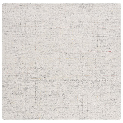 Meira Hand Tufted Area Rug in Ivory