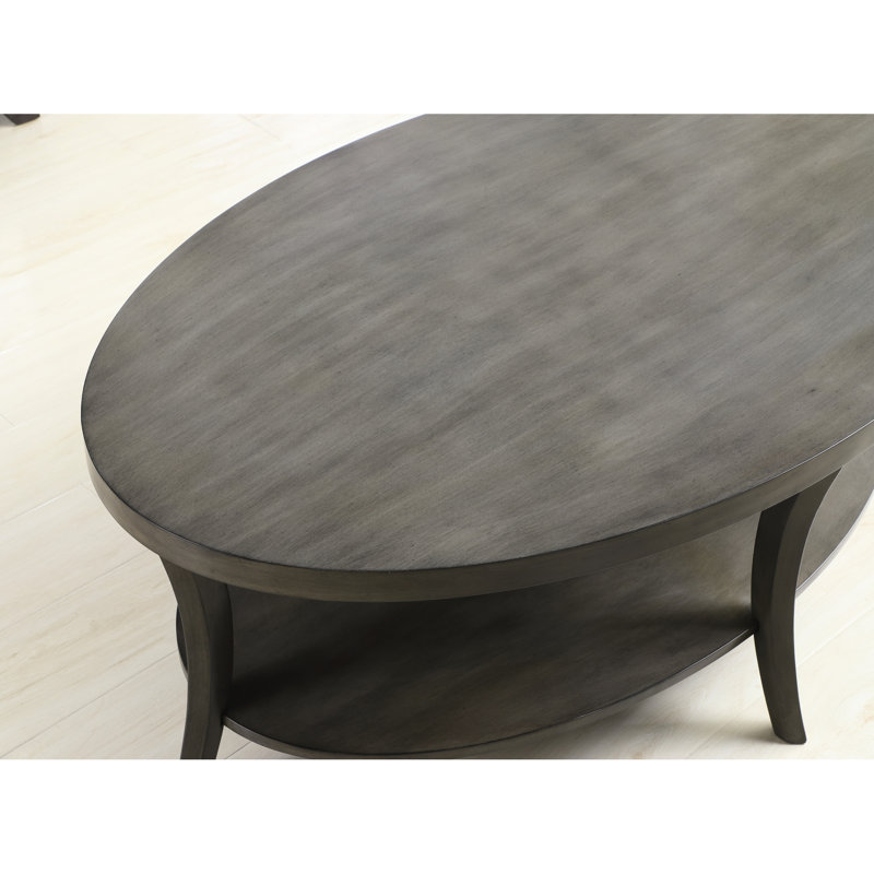 Table basse contemporaine contemporaine ovale en gris - moderne avec placage en bois de bouleau et espace de rangement supplémentaire