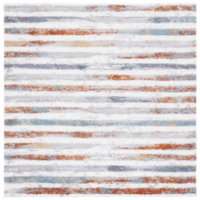 Joua Striped Blue Rust/Ivory Area Rug