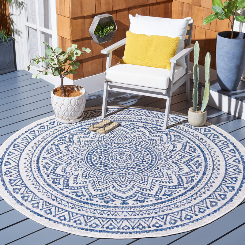 Tapis intérieur / extérieur ivoire / bleu marine Ellefson, Rond 4 pi