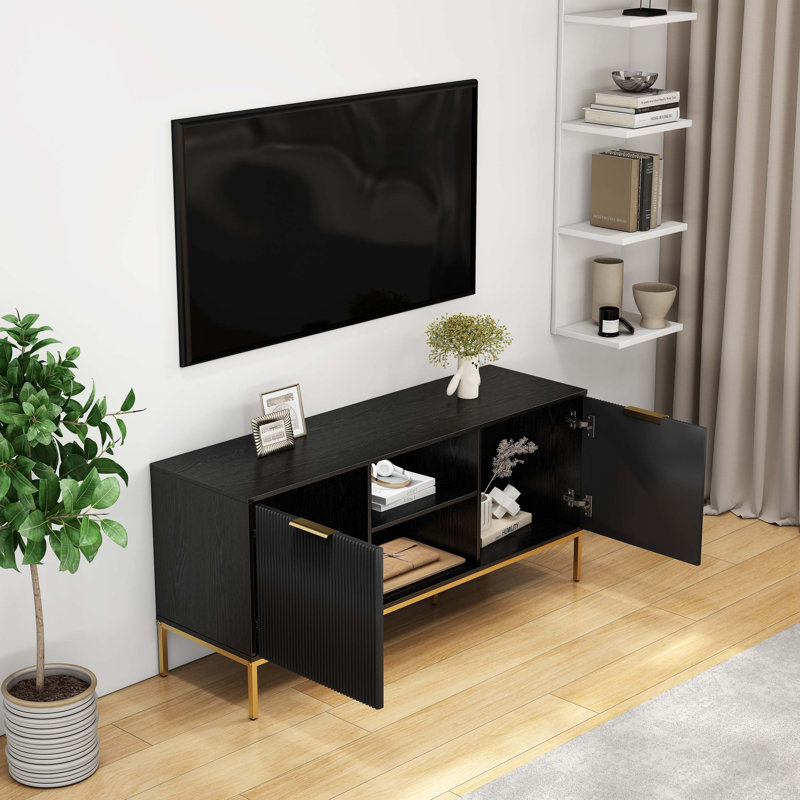 Meuble télé moderne avec portes ondulées et charnières à fermeture en douceur pour le rangement dans le salon et l'organisation des médias.