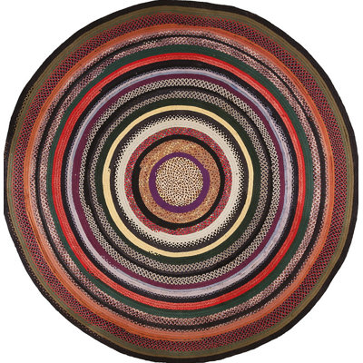 Tapis rond tressé antique à motif circulaire