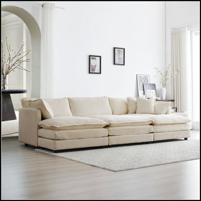 Canapé modulaire confortable avec repose-pieds pour le salon, idéal pour la détente et l'agencement flexible