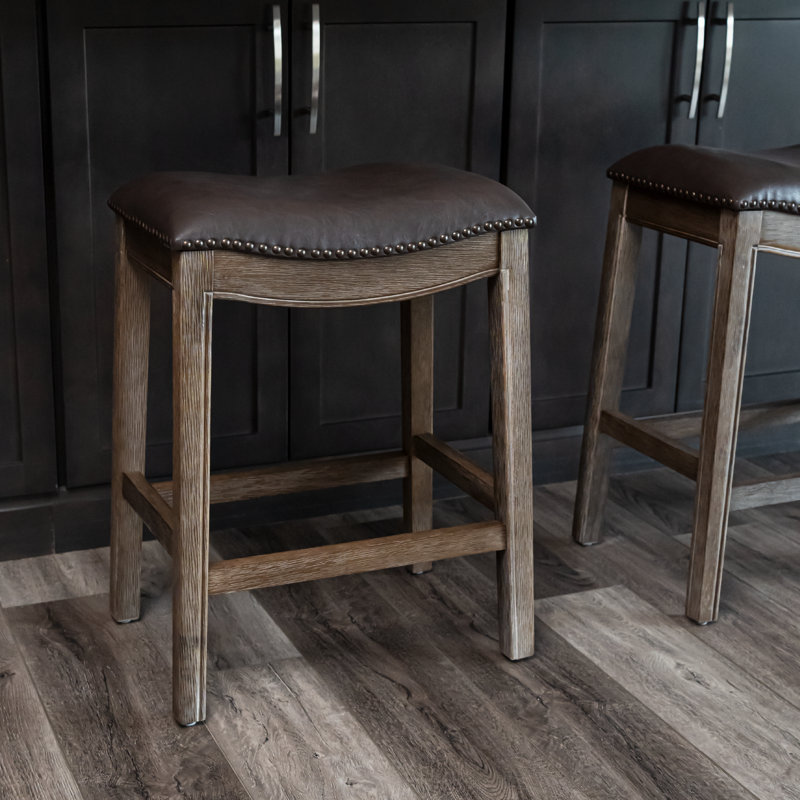 Maven Lane Adrien Backless Saddle Stool with Faux Leather Upholstery, Counter Stool (26" Seat Height)