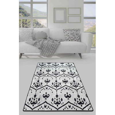 Tapis gris / noir en polyester et velours touffeté à la machine Jacobs