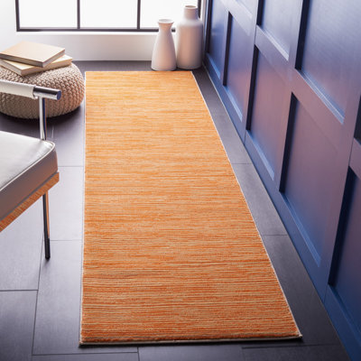 Ahir Orange Area Rug